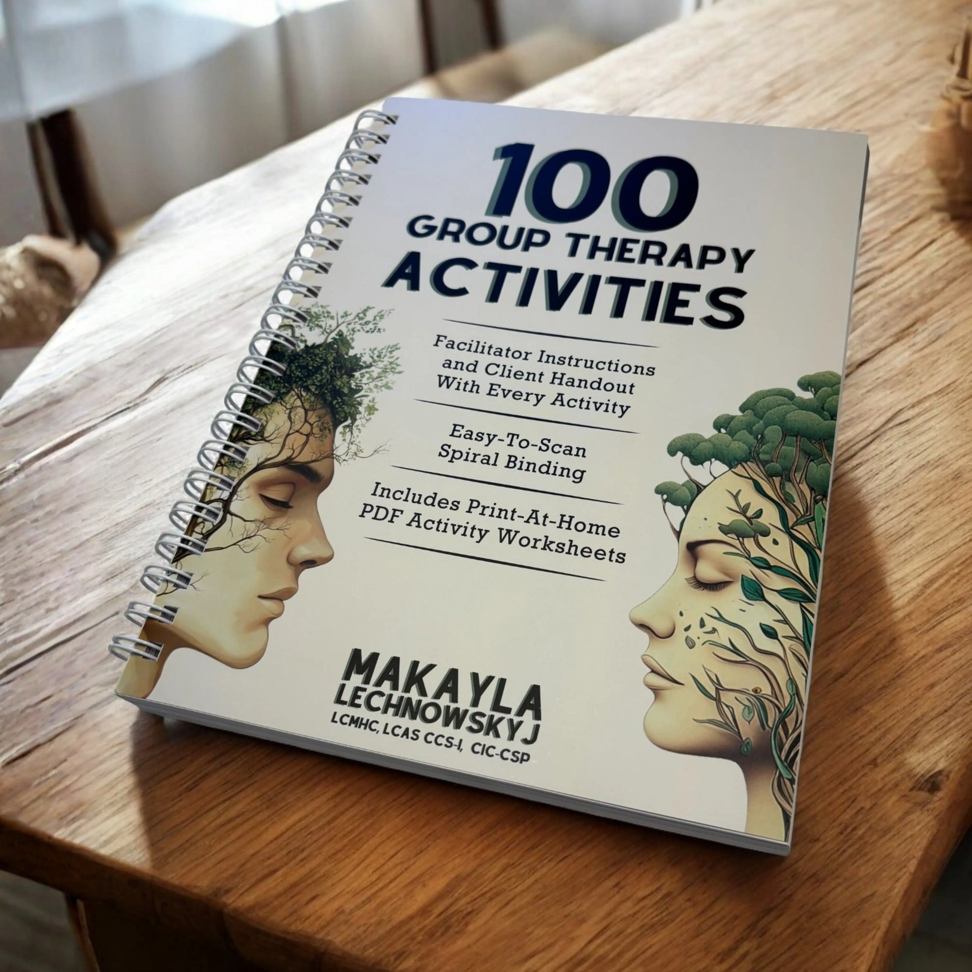 A close-up of the front cover of the 100 Group Therapy Activities book by Makayla Lechnowskyj, showing its durable spiral binding.